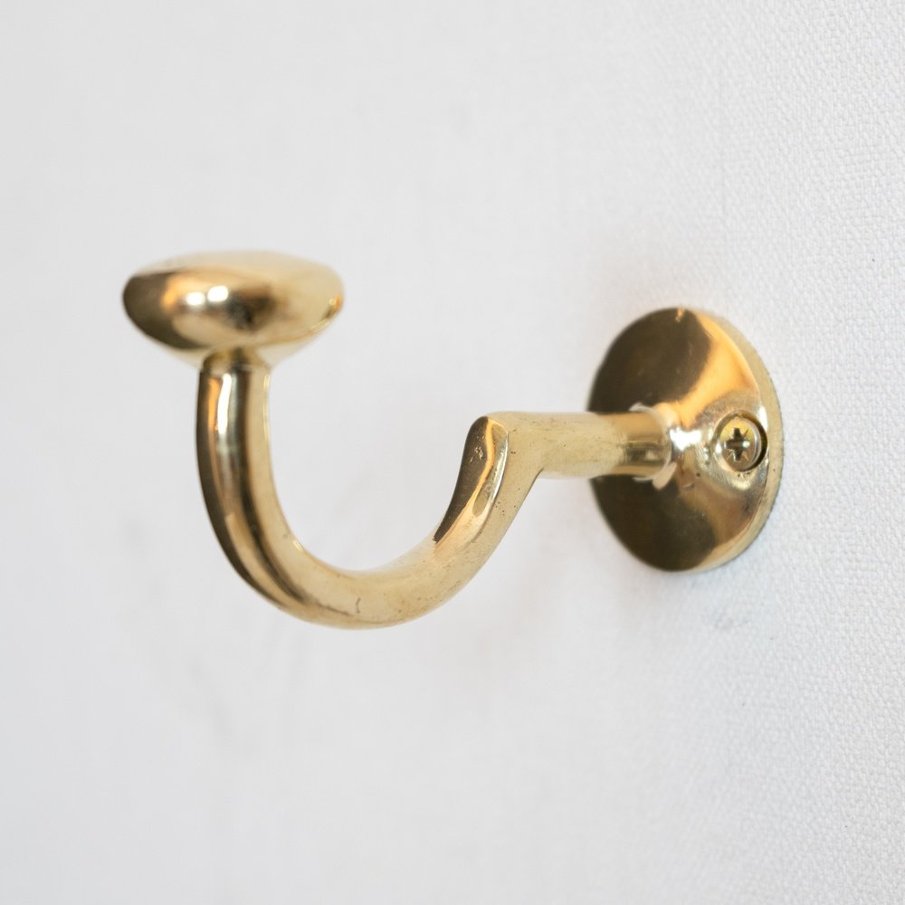 http://www.brassna.com/cdn/shop/products/handcrafted-unlacquered-brass-hooks-for-wall-727155.jpg?v=1705537988