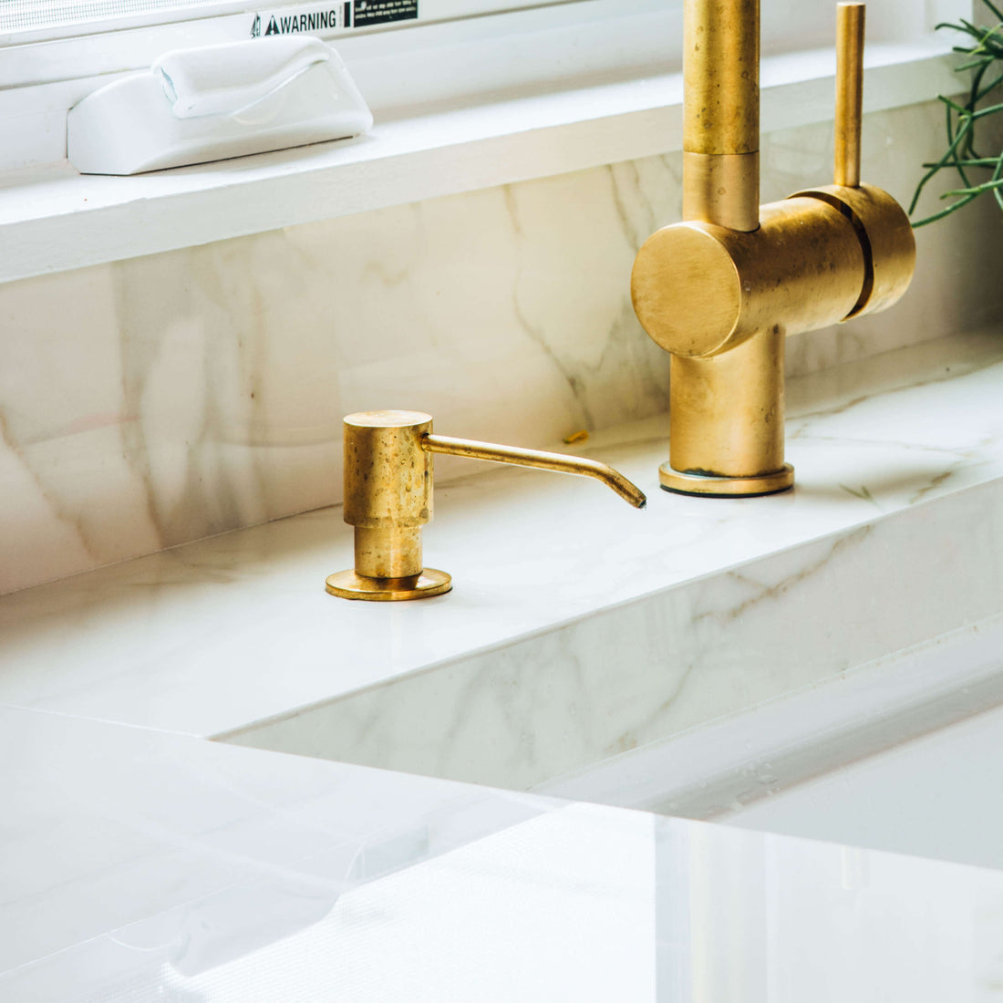 Unlacquered brass soap dispenser